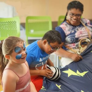 This is an image of young people at our Carers Leeds Family Fun Day.