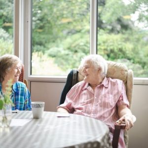 This is an image of two people at a day centre.