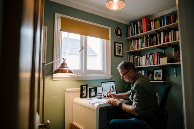 A person at a desk writing
