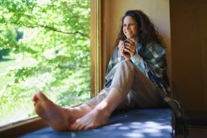 Image of a carer with a cup of tea